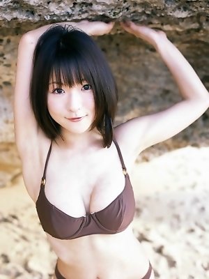 Stacked asian hottie displays her big busty tits in lingerie