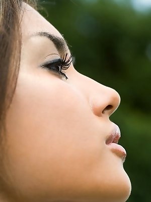 Maria sexy Asian teen model shows off her hot body in her nimi skirt