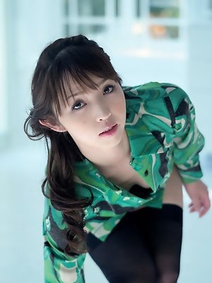 Neo Asian in long dress goes to enjoy reading book in the forest