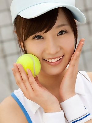 Kana Yuuki Asian shows flexibility while playing with tennis ball