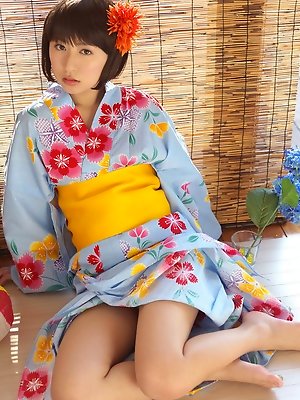 Rio Matsushita Asian shows sexy legs under geisha dress outdoor