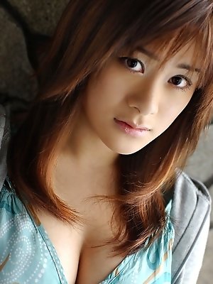 Hot Asian college student shows big tits and a flash of her nice round ass