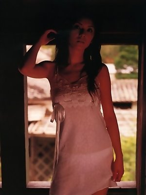 Sexy gravure idol entices in her provacative pink lace lingerie