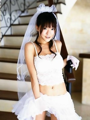 Stacked asian hottie displays her big busty tits in lingerie